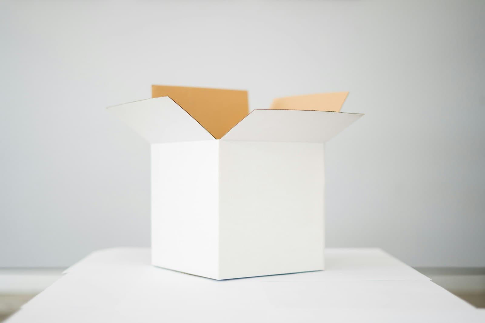 New-hire kits in custom packaging, shipped before day one.